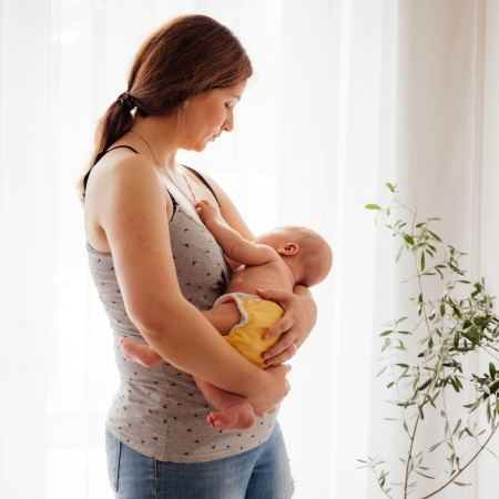 Woman in Postpartum Depression Feeling Unemotional and Exhausted